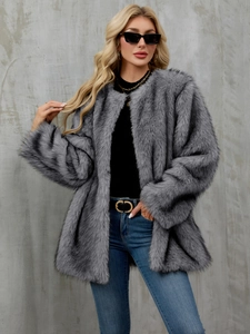 Detailed close-up of gray faux fur coat texture with thick plush fibers and soft finish