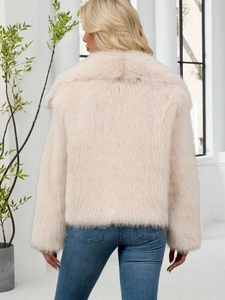 Back view of a short faux fur jacket for women in cream beige with a soft plush texture
