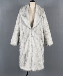 Detail view of high-quality faux fur texture and lapel design on long winter coat