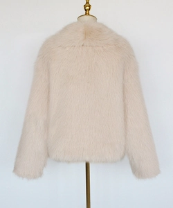 Detailed back view of a light pink faux fur short jacket with dense plush texture