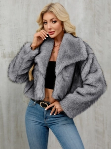 Detail of grey faux fur jacket with large lapel collar and dense plush texture