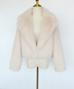 Close-up of plush faux fur texture and elegant notched lapel on this winter jacket