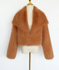 Detailed texture of caramel faux fox fur short jacket with oversized lapel collar