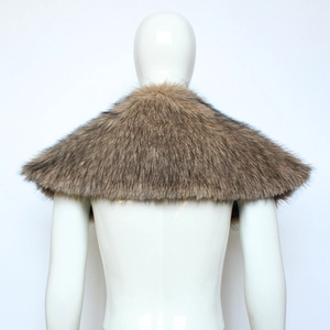 Detailed view of brown faux fur medieval cape shawl accessory on a white model mannequin
