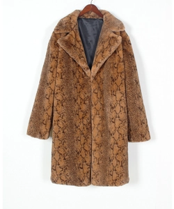 Detail view of the snakeskin pattern texture on the brown faux fur coat with lapels