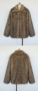 Detailed view of brown faux fur texture and collar on a plush winter coat