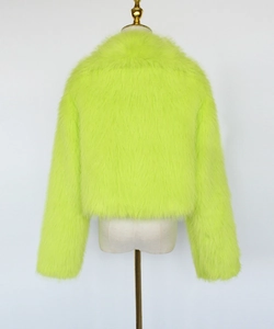 Detailed back view of a plush neon green faux fur short jacket for women in winter
