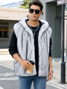 Close-up of light gray faux fox fur texture on men's hooded vest in outdoor setting