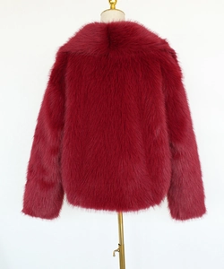 Back view of burgundy faux fur coat with thick fluffy texture and wide collar