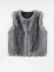 Close-up of faux fur vest featuring soft grey texture and smooth black V-neck lining