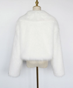 Detailed back view of a white faux fur short jacket with soft plush texture for women