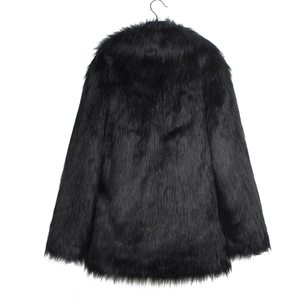 Close-up of the plush long-hair texture on a black faux fur winter coat for women