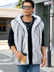 Close-up of grey and white faux fox fur hooded vest showing plush texture and long hair