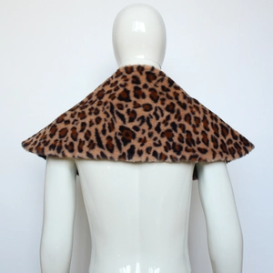 Close-up of leopard print faux fur viking cape shawl for medieval halloween costumes