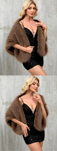 Detail of brown faux fur shawl with plush texture over a black sequin evening dress