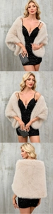 Detail of faux fox fur shawl in beige paired with a black sequin evening gown dress