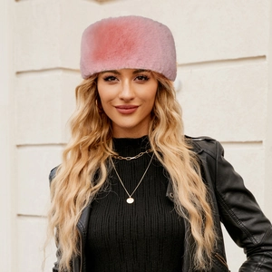 Close-up of pink faux fur winter headband showing soft texture and fluffy warmth