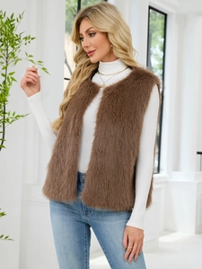 Close-up detail of plush brown faux fur vest texture and stylish sleeveless V-neck design