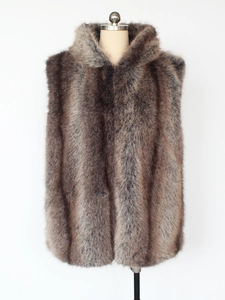 Detail of faux fox fur vest showing the plush striped texture and thick fluffy material