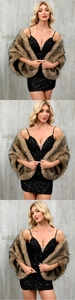 Detail of a brown faux fur shawl layered over a black sequin evening gown with thin straps