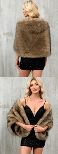 Detailed view of the thick faux fox fur shawl with brown gradient and dark tips