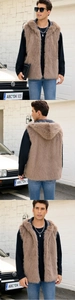 Close-up of brown faux fur vest for men featuring high-quality hood and leather lining details