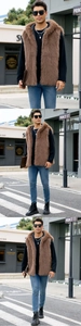 Brown faux fur hooded vest styled with black shirt and blue jeans on a city street