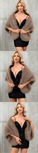 Close-up of brown faux fur shawl paired with a black sequin dress for evening wear