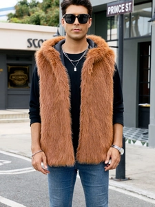 Men's brown faux fur hooded vest jacket paired with jeans and a long sleeve shirt