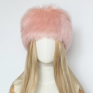 Detail of pink faux fur Cossack hat showing thick plush texture and warm material