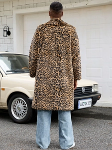 Manteau léopard en fausse fourrure pour homme avec col à revers et manches longues d'hiver