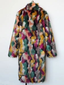 Close-up detail of multi-color faux fur coat with plush texture and vibrant patchwork patterns
