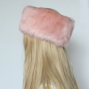 Rear view of a pink faux fur headband for women showing soft fluffy plush texture