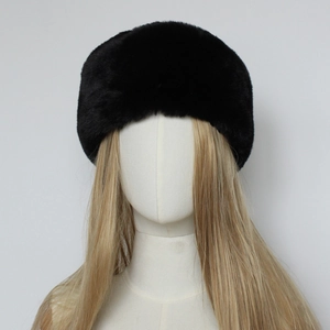 Detail shot of a black faux fur cossack hat for women on a mannequin head