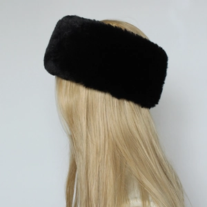 Close-up of black faux fur headband for women showing warm plush texture and ear cover