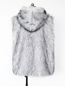 Detailed macro view of plush grey faux fur texture on a hooded winter vest for men