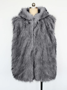 Detailed texture of grey faux fur fabric on a modern men's hooded puffer vest jacket
