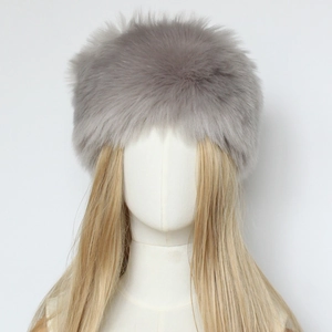 Detailed close-up showing the high-density fluffy gray faux fur texture of the winter headband