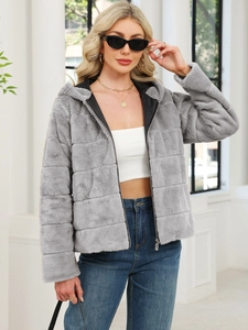 Detail of grey faux fur jacket featuring horizontal quilting and high quality texture