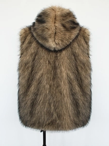 Detail view of the thick faux fur texture and hood on the dark brown gradient vest