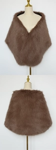 Close-up of brown faux fox fur shawl with plush texture and smooth black inner lining