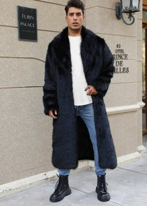 Close-up of black faux fur long coat with dense texture and large lapel collar