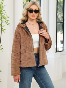 Detail of soft caramel brown faux fur jacket featuring horizontal quilted texture and hood