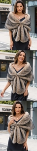 Detailed texture of gray and beige faux fox fur shawl with fluffy striped design