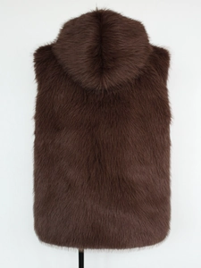Close-up of the plush faux fur texture and hood on a warm brown winter vest