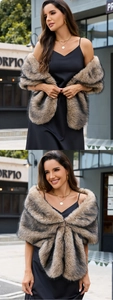 Detailed view of fluffy brown faux fur shawl with thick texture on black dress