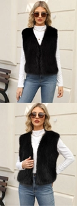 Close-up of high-quality black faux fur vest with soft texture and elegant V-neck design