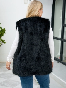 Rear view of long black faux fur vest showing the thick texture and mid-length sleeveless fit
