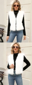 Detail shot of dense fluffy white faux fur vest with V-neck sleeveless design
