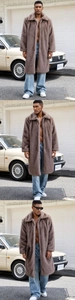 Detailed close-up showing the premium faux fur texture and wide lapel of the men's long coat